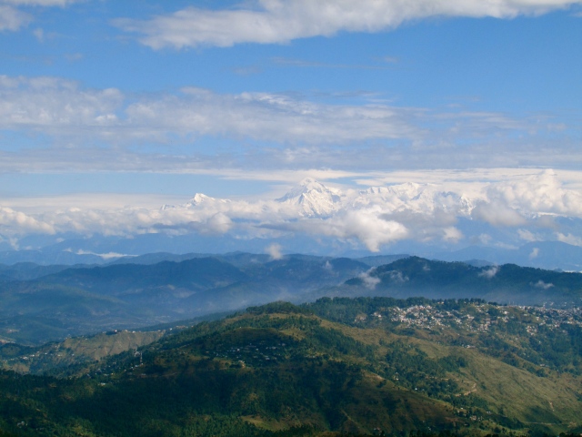 The mountains with the Himalayan peaks in the background. 